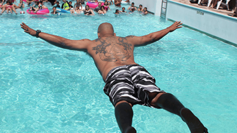 Man making a big belly flop